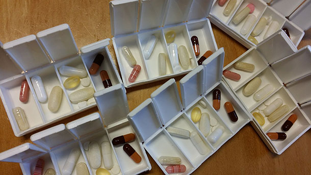 Medications in small pill boxes
