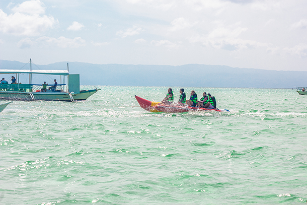 Manjuyod Sandbar Tour Package and Things To Do: Go on a Banana Boat Ride